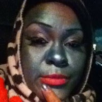 a woman with silver paint on her face